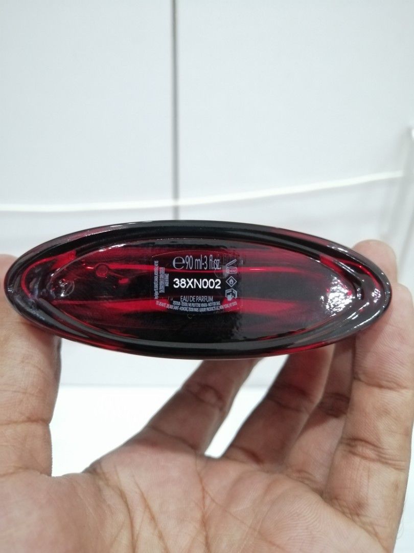 BLACK OPIUM EAU DE PARFUM OVER RED